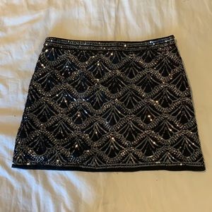 Black beaded mini skirt